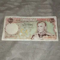 اسکناس ۱۰۰۰ریالی مال دوره محمد رضا شاه