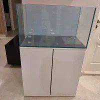 شیشه و میز آکواریوم