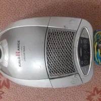 جاروبرقی و یک دست کت شلوار