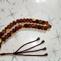 تسبیح کهربا پرچمی