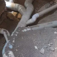 تخریب ساختمان وخاکبرداری وصل اگولوله کشی فاضلاب