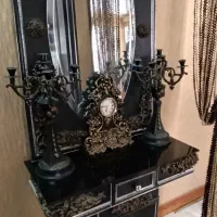 آینه و شمعدان با ساعت