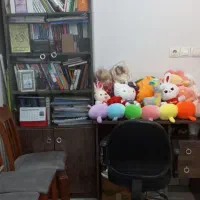 کتابخانه و میز تحریر و صندلی چرخ دار