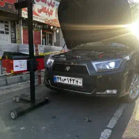 تنظیم چراغ خودرو با دستگاه لیزری