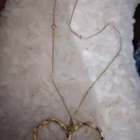 گوشواره و یک زنجیر نو  به قیمت تابلو + ۲ درصد