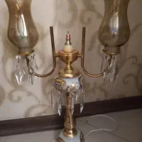 یک عدد شمعدان قدیمی ومجسمه