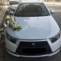 اجاره ماشین عروس دنا پلاس سفید گل آرایی ماشین عروس