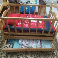 گهواره کنار تخت مادر