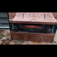 بخاری گازی مروارید سوز طرح شومینه 12هزار  سالم