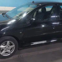 ۲۰۷ مشکی مدل ۹۹ فرمان برقی