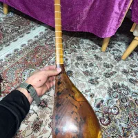 ساز تنبور کاسه ایی|سازهای سنتی|قدس, شهر‌قدس|دیوار