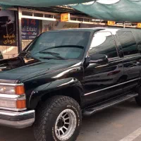 شیشه دودی در محل و درب مغازه
