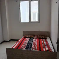 دوخوابه دارای پارکینگ وآسانسور