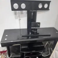 فروش تلویزیون همراه میز شیشه ای