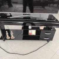 میز تلویزیون شیشه ای