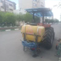 سم پاشی درختان با تراکتور و نیسان