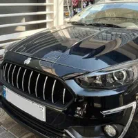 ماشین اطلس سفید   مشکی با سانروف مدل ۱۴۰۴