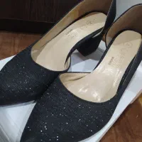 کیف و کفش مجلسی|کیف، کفش، کمربند|کاشان, کوشک صفی|دیوار