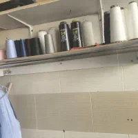 میز اتو و میز برش ۴عدد قفسه چوبی و رگال