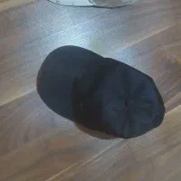 کلاه کپ سفید و مشکی کار نکرده