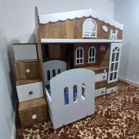یک عدد تخت خواب کلبه دو طبقه