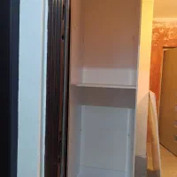 کابینت ام دی اف ایستاده|کتابخانه، شلف، قفسه‌های دیواری|فولادشهر, مسکن مهر فولادشهر|دیوار
