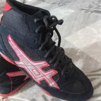 لباس وکفش کشتی