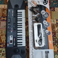 گیتار و کیبورد اسباب بازی