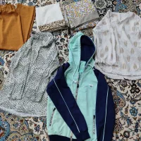 تعدادی لباس درحدنو