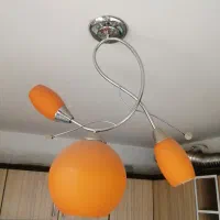 لوستر و ساعت دیواری