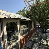 ۵۰۰ متر باغچه چهاردیوار با بنا قدیمی/زیرقیمت|فروش زمین و ملک کلنگی|کرج, برغان|دیوار