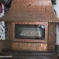 بخاری دیواری و شومینه ای کاملا سالم