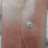 یه کیف پول مشکی با مدارک گمشده در زینبیه