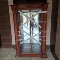 ویترین چهار طبقه آینه و هالوژن دار با چوب گردو|بوفه، ویترین، کنسول|اصفهان, جلالیه|دیوار