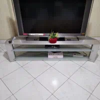 میز تلویزون جا دار زیبا نقره ای سالم وشیک