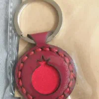 تعدادی جاسویچی چرم شکل انار مناسب هدیه شب یلدا