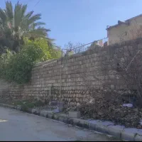 زمین چهارتنگ ۲هزار متر پلن مربع اوایل جاده چهارلنگ