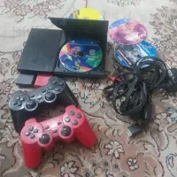 PS2سالم و سلامت درحد همراه ۵ عدد سی دی بازی