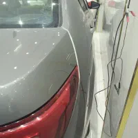 دنا پلاس اتوماتیک مدل 1400|خودرو سواری و وانت|قم, دروازه چوبی|دیوار