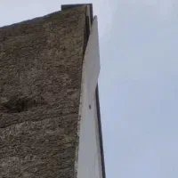 محکم سازی سنگ های نمای ساختمان با پیچ و رولپلاک