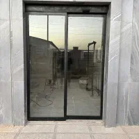 دراتوماتیک شیشه ای نردهشیشه ای جانپناه کرکره برقی