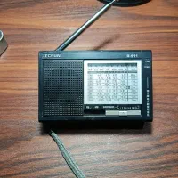 رادیو TECSUN - R911 سالم و روشن بدون بازشدن