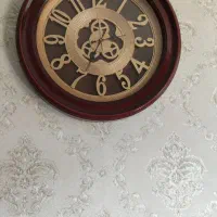 ساعت و جادستمال و سطل