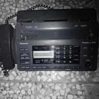 دو دستگاه تلفن . منشی.پرینتر‌.فاکس