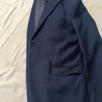 یک دست کت و شلوار تمیز و سالم