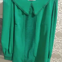 شومیز یلدایی رنگش پر رنگه کمرنگ افتاده