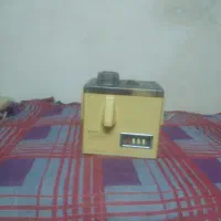 یک عدد آبمیوه گیر