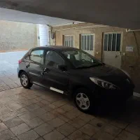 پژو ۲۰۷  مشکی صفراتومات  سقف شیشه ای ارتقا یافته