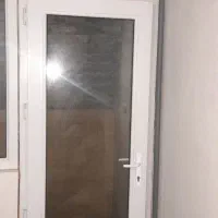 درب بالکن و پنجره پی وی سی در حد نو