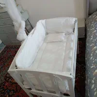 تخت کنار مادر نوزادی